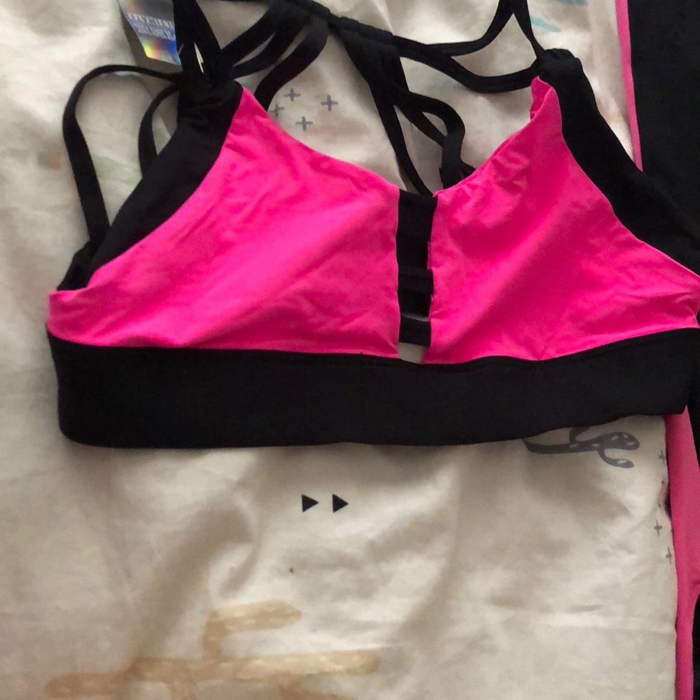 A pink Victoria secret sports bra no padding